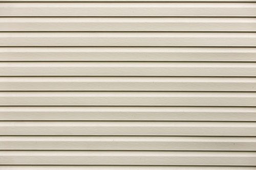 White flat horizontal surface texture. Vinyl plastic planks, boards siding, copy space background.